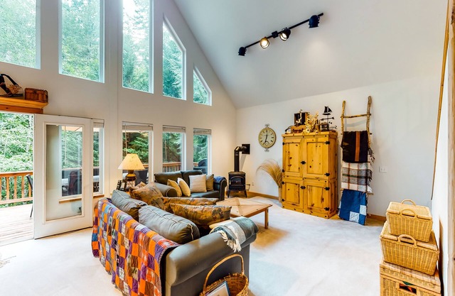 Rural, dog-friendly home with loft, deck, firepit, private grill, and game room