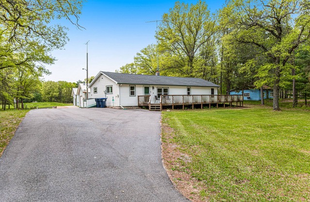 Rural retreat near Necedah National Wildlife Refuge with deck, firepit, & grill