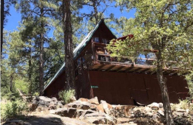rustic a frame cabin in woods