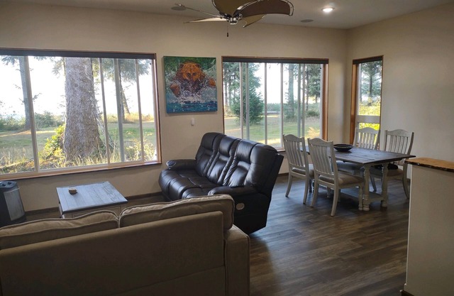 Walk out the front door, across a grass lawn and onto a sandy beach