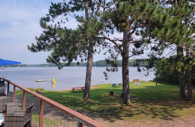 Rustic cabin getaway on the shore of Soo Lake in Phillips, WI