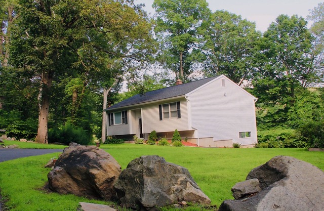 3-bedroom raised-ranch cabin in tranquil wooded area w/ WiFi, fitness, and games