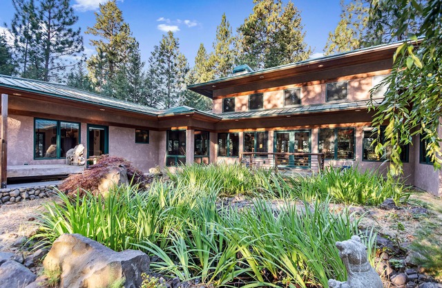 Rustic contemporary home in forest setting overlooking Lake Coeur d'Alene
