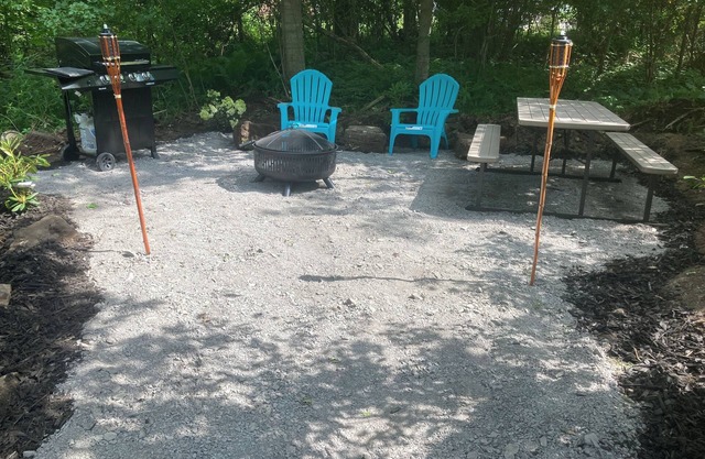 Rv and campsite on the Deer River. 50 amp, sewage dump. 15x60 pad
