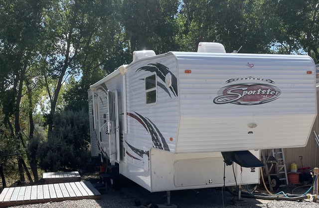 RV hookup next to our family friendly home. Between Aztec, NM and Durango, CO