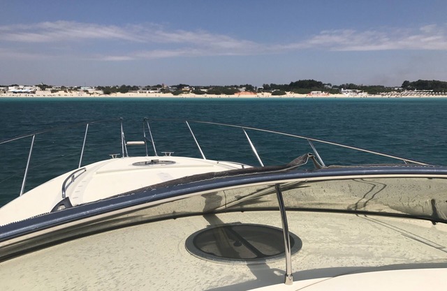 Salento Sonne in Begleitung unseres Bootes "Sciala Core"