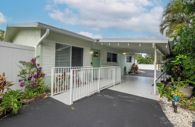 Salty Sea Home Tequesta! This a 4-bedroom 2-bath fully furnished home, sleeps 8.