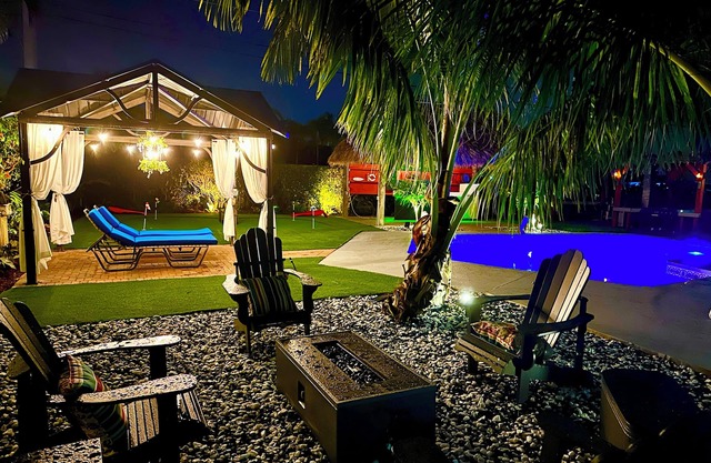 Sanctuary sleeps 16 in 7 BD, 6 BA. Heated pool. Tiki bar. Pickle ball. Gameroom
