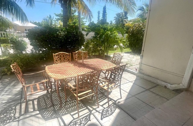 Sandy Beach within minutes from your private garden patio
