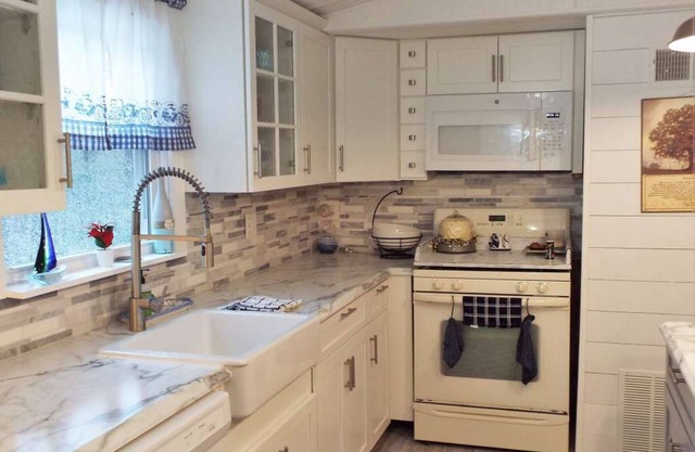 Sandy's Lake Chateau - Beautifully updated home on 3 private acres.