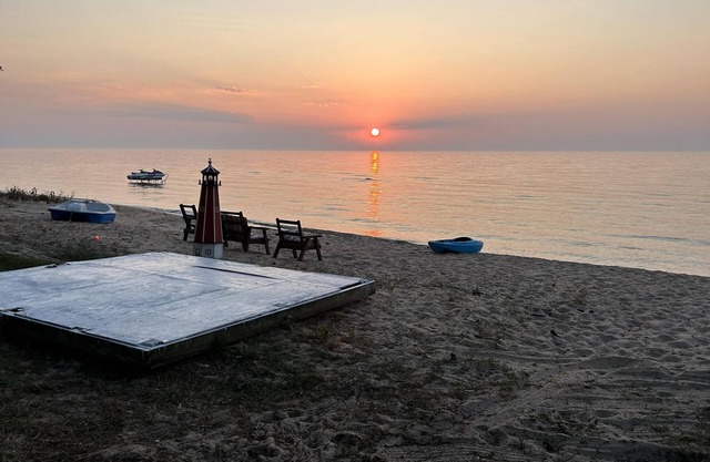 Sandy Toes Retreat: Winter Wonderland Awaits at Sandy Toes Retreat: Ice Fishing, Snowmobiling & More
