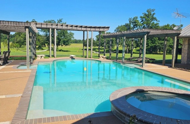 Sanita Ranch with large pool, hot tub, game room and outdoor firepit.