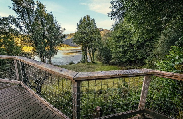 Water-side River Retreat w/ Lawn Games Massive Deck Wood Stove Mtn Views