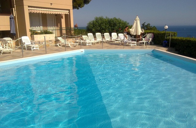 Sea view apartment with breathtaking communal pool terrace and garden