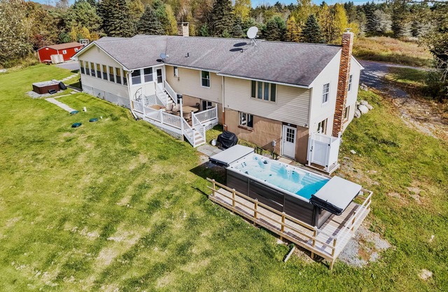 Secluded 20 acre Near ski, fish. Hot tub, swim spa