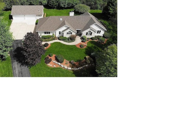 Secluded 3 bedroom luxury home with 3 car garage.