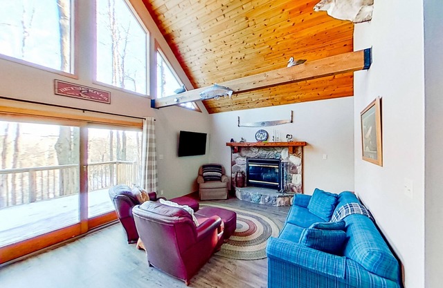 Secluded dog-friendly riverfront home with deck, firepit, fireplace, & grill