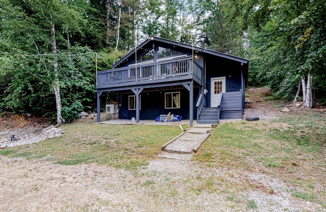 Secluded home with gas woodstove, new kitchen & AC - near ski resort & trails