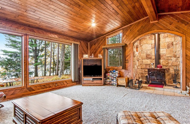 Secluded lakefront home with kayaks, canoe, swim platform, firepit, & W/D