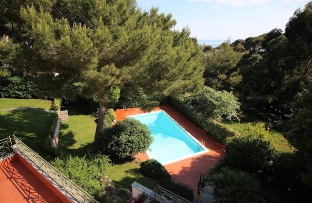 Second floor apartment in villa with swimming pool