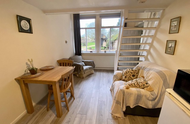 Self-catering, galleried studio cottage with parking outside