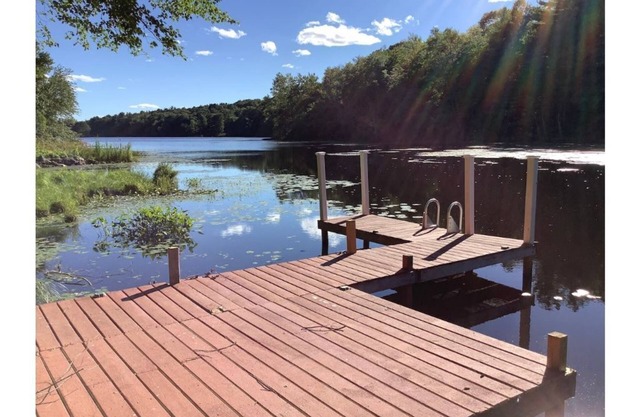 Serene 4-acre estate on private lake with hot tub