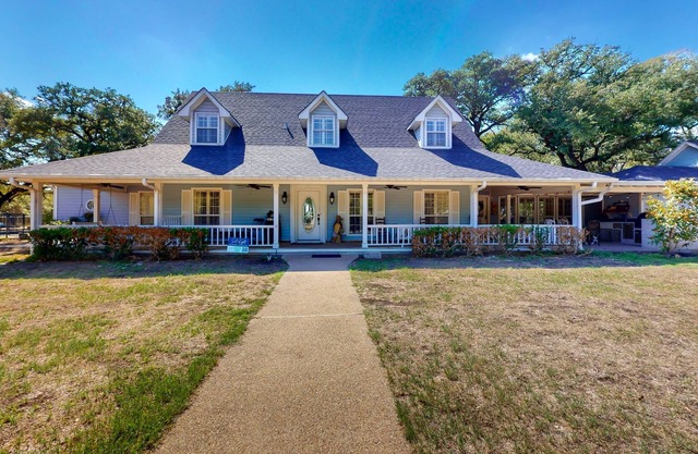 Serene and spacious ranch with a pool, outdoor kitchen, and walking trails