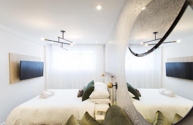 Serene and Styled Little Italy Studio full bath by Den Stays