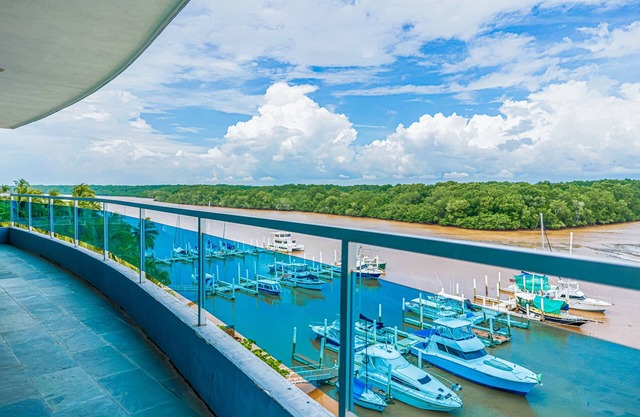Serene condo with ocean views, modern amenities & pool access