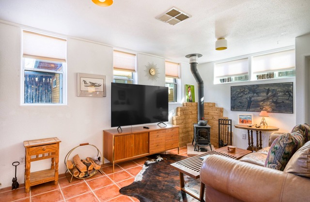 Serene dog-friendly home with wood stove, washer/dryer, patio, deck, & WiFi