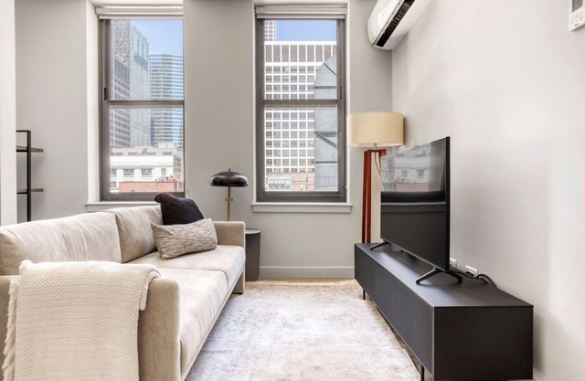 Serene Loop 1BR w/ Gym, Roof & Lounge, same block as L, by Blueground