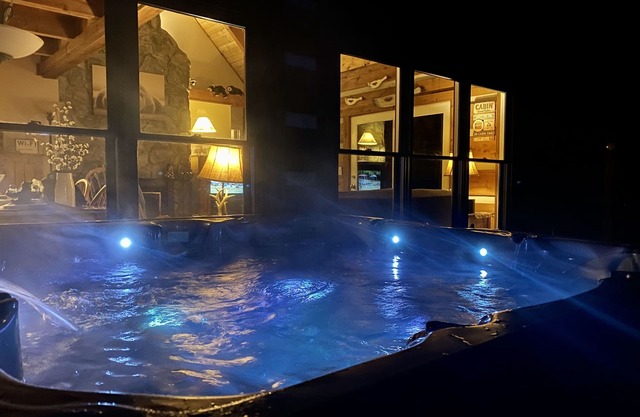 Serene mountain cabin on 10 acres with hot tub, creek and waterfall near Boone!