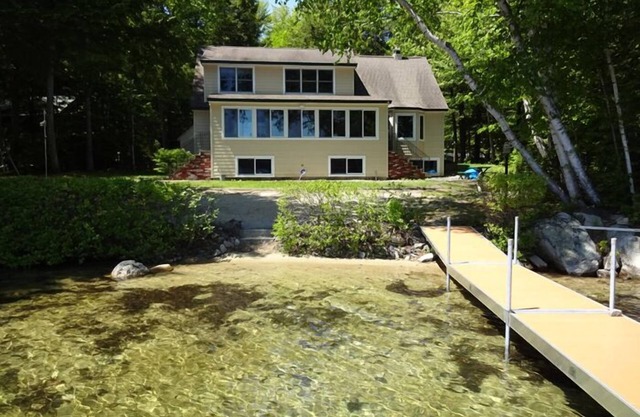 Serene waterfront escape on Trickey Pond with beautiful sandy beach!