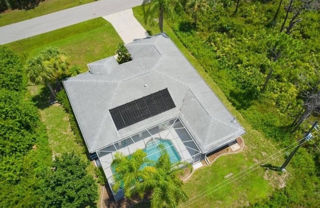 Single family pool home in a quiet neighborhood, close to five beaches,