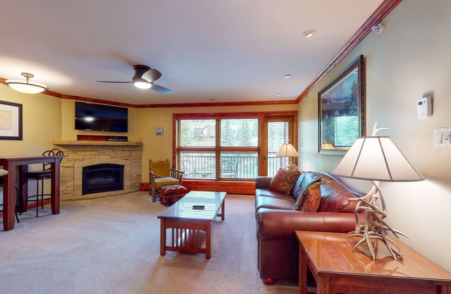 Ski-in/out, mountain view condo w/ fireplace, fast WiFi, shared pool/WD/hot tub