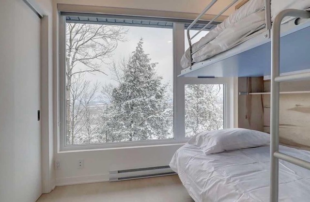 SKI-IN/SKI-OUT - Bromont - 2 bedroom condo on 2 floors - on the ski slope!!