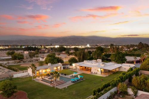 Sleeps 20 Architectural Mansion w Pool Indoor Tennis Court Game Room Starlight Estate by AvantStay