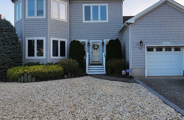 Snug Harbor waterfront property with pool. Minutes to Barnegat Bay and beach