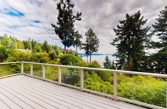Sound view home full of vintage charm with game room, wood stove, & gas grill