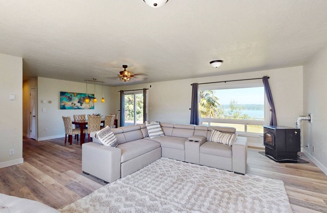 Soundfront home with WiFi, washer/dryer, central AC, and enclosed yard