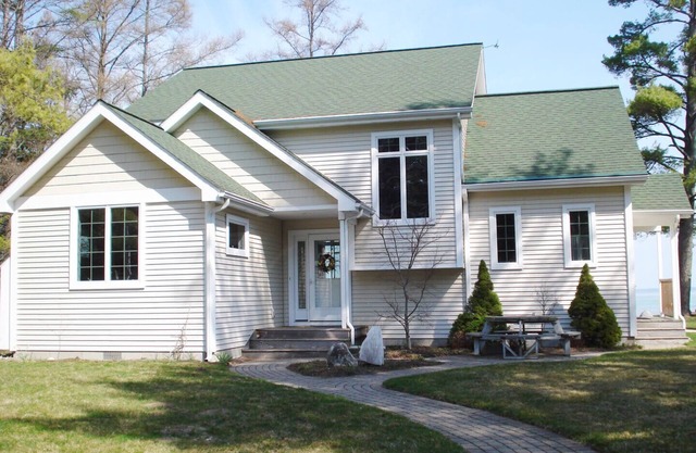 TORCH LAKE SANDY BEACH FRONTAGE