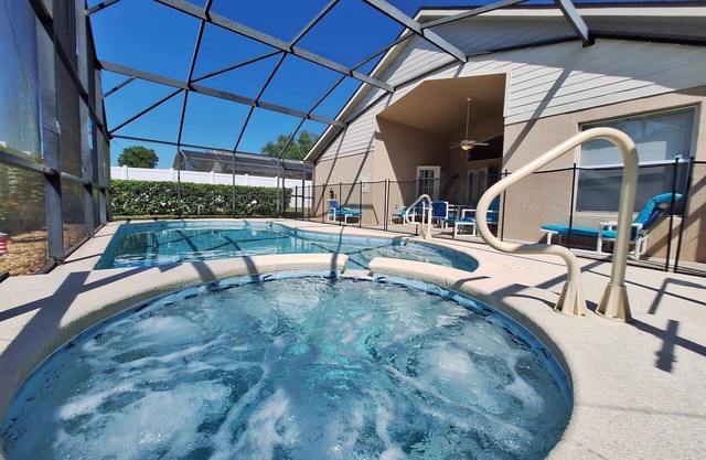 South facing four bedroom home, solar heated private pool, spa and games room.