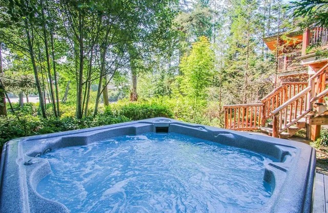 South Swell Tofino (formerly Blue Heron) Waterfront home amid old growth cedars