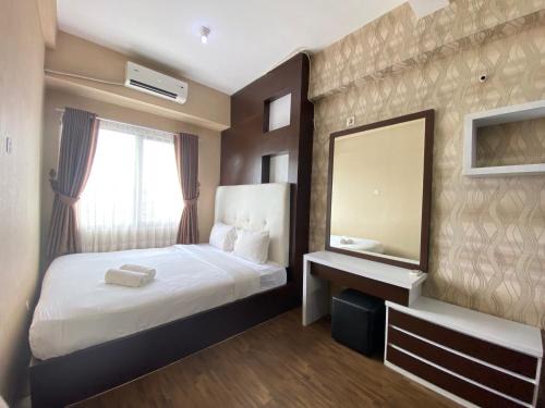 Spacious 1BR at Tamansari Panoramic Apartment near Metro Indah Mall By Travelio