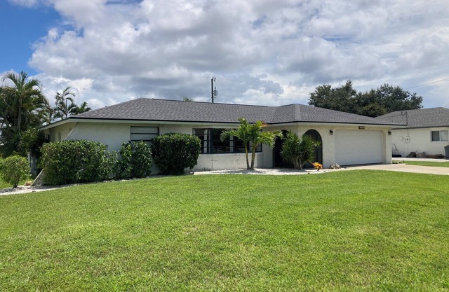 Spacious 3-bedroom home with backyard oasis, private heated pool, close to beach