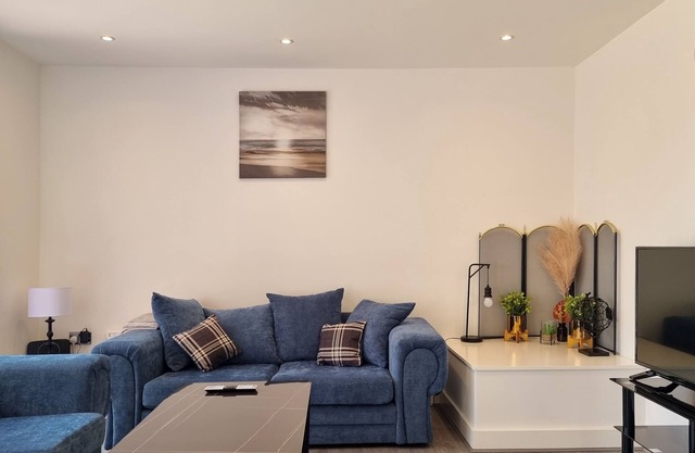 Spacious 4-Bed Home with Parking