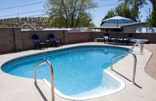 Spacious 4-Bedroom Retreat with Pool, Game Barn & Prime Location!