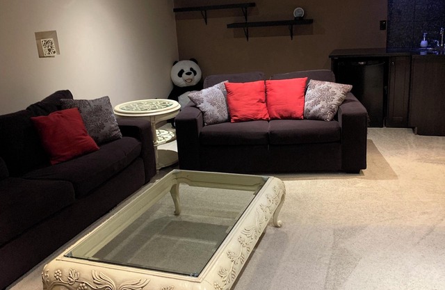 Spacious 4-bedroom townhome in charming Red Deer with WiFi, AC