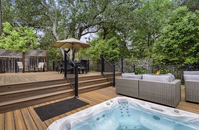 Spacious 4BD 3BA with hot tub, fire pit, and wraparound deck