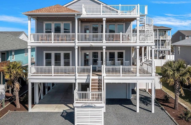 Spacious 5 bedroom 5 bath House with pool and direct access to the beach.